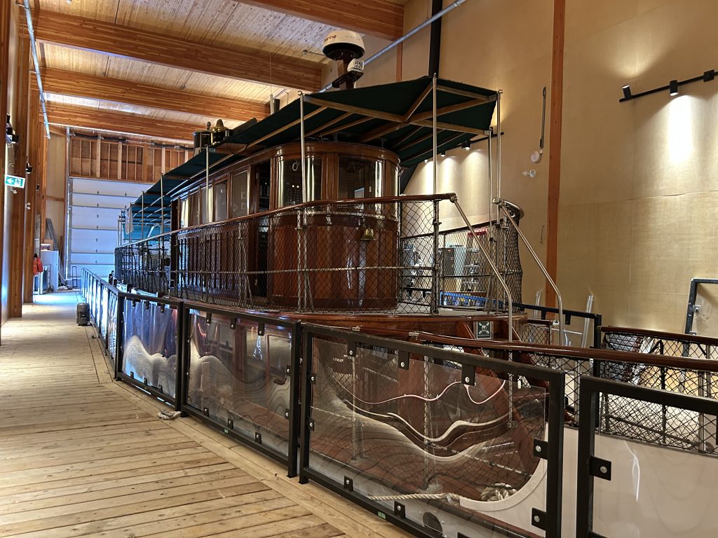 Wanda III docked in boathouse view from the left of the bow