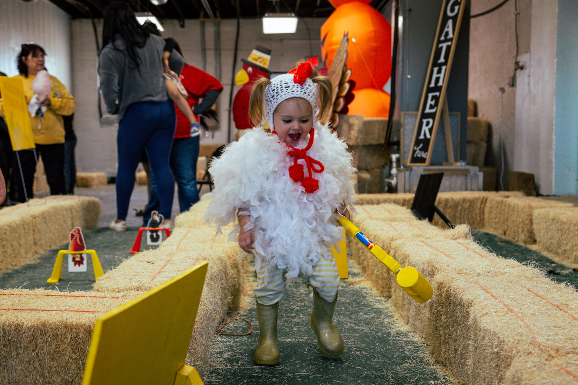 Child in chicken costume at Cackle Hatchery Annual Chicken Festival